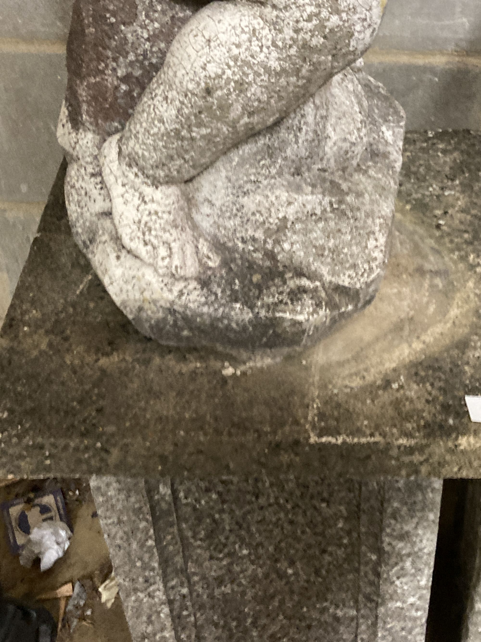 A reconstituted stone garden figure on plinth, boy with a sea shell, height 154cm